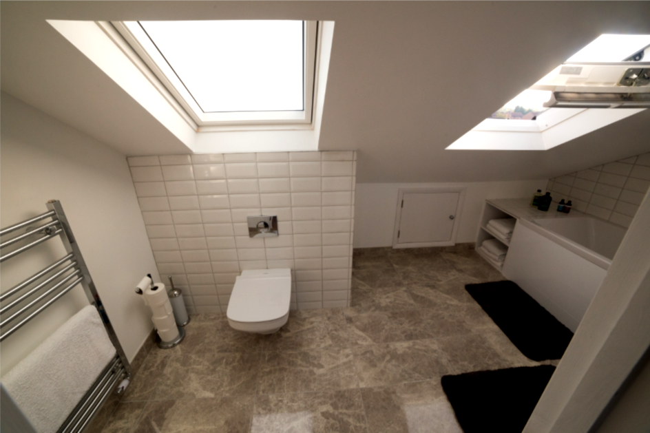 Bathroom suite in large dormer conversion in Maidenhead